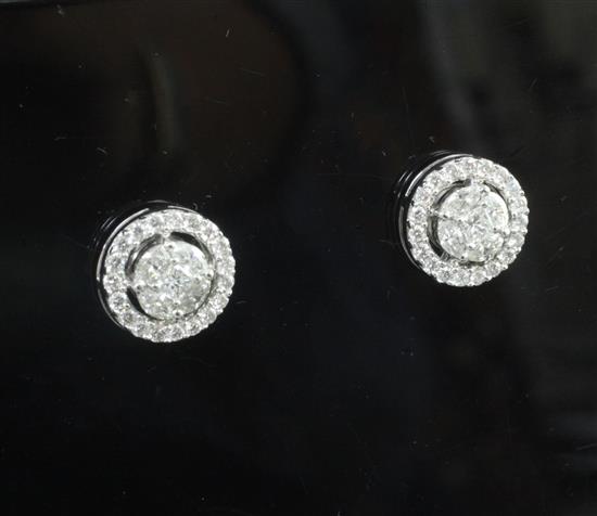 A pair of modern 18ct white gold and diamond cluster target earrings, 10mm.